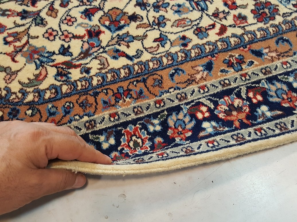 תיקון קנטים לשטיח בעבודת יד