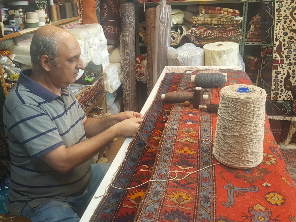 תיקון שטיח - תפירת קנטים לשטיח עבודת יד