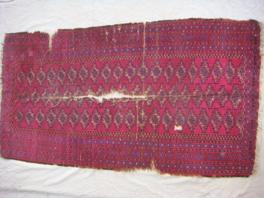 שטיח אפגני עתיק שחוק ובלוי