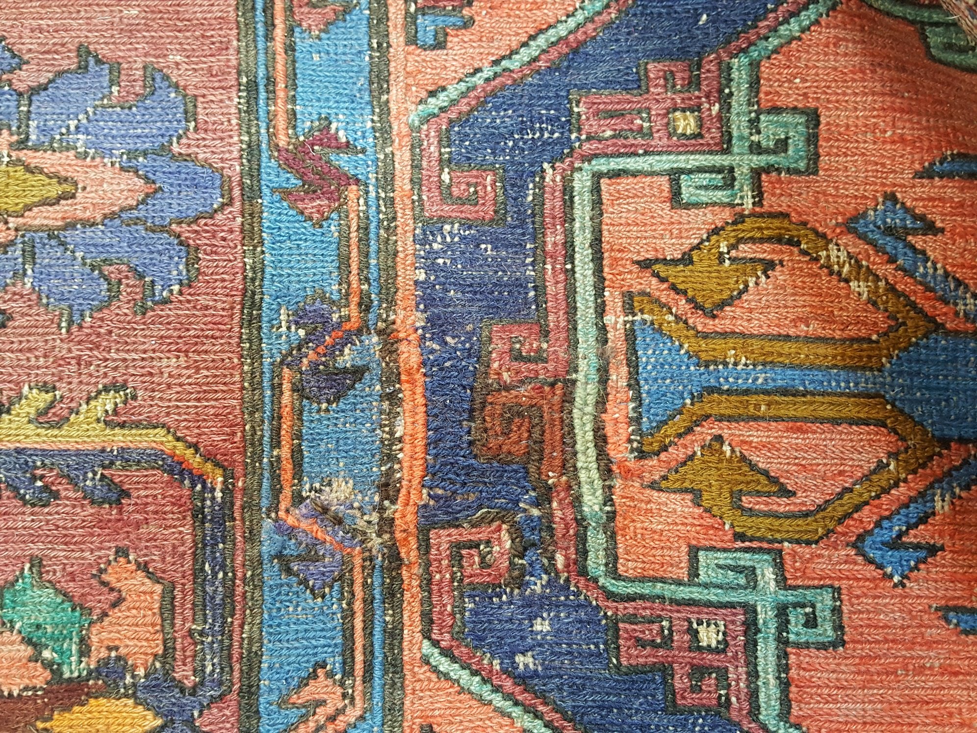 תיקון חור בשטיח עבודת יד