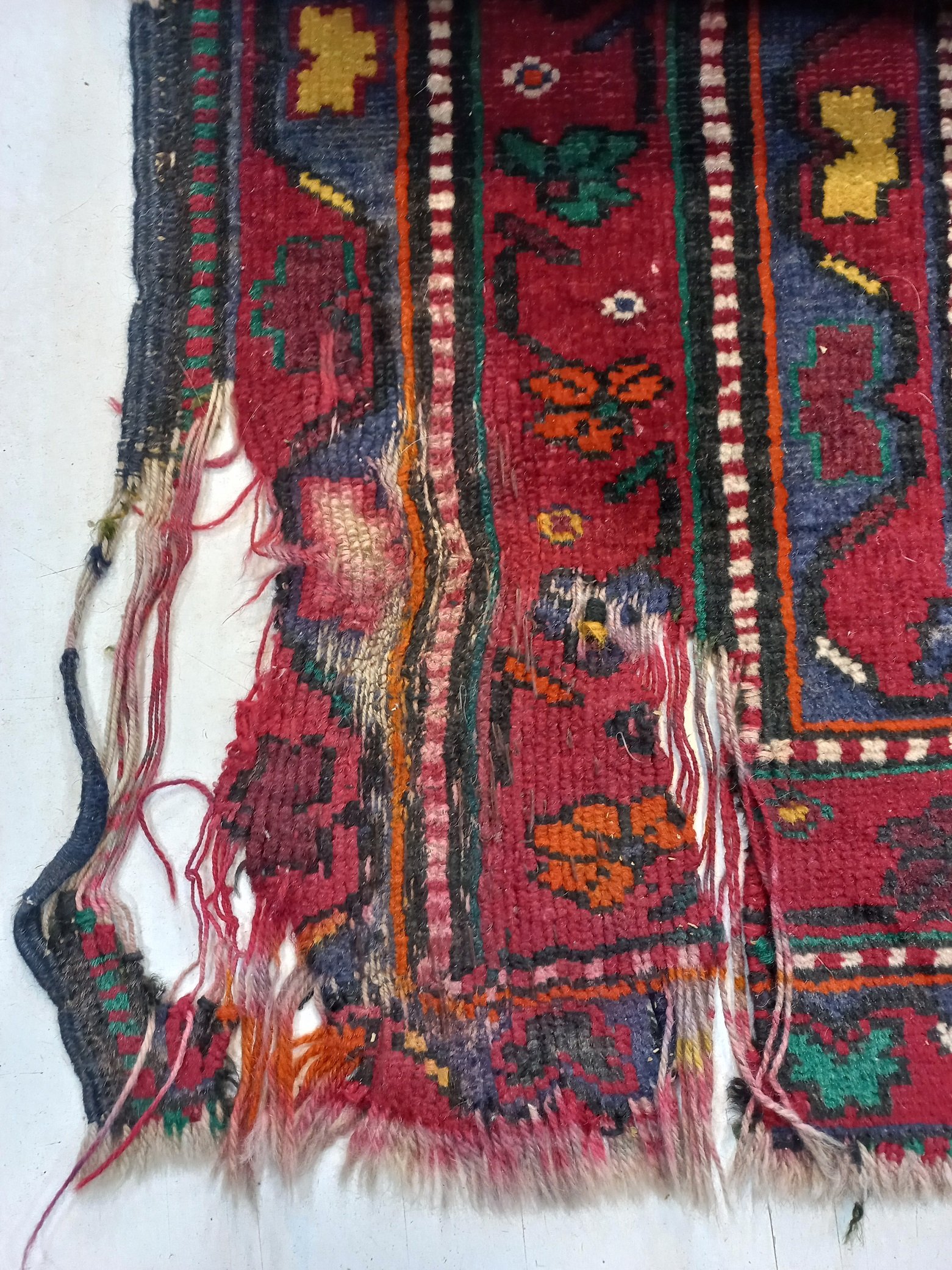 תיקון אומנותי של שטיח טורקי קרוע ורקוב