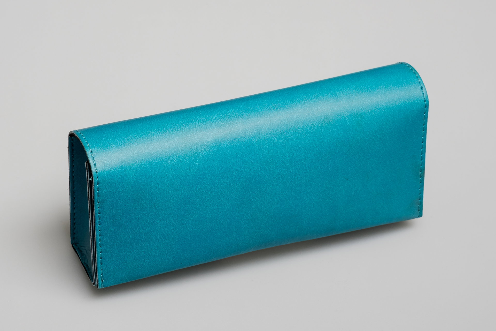 Art. 306 - Estuche semirrígido para anteojos