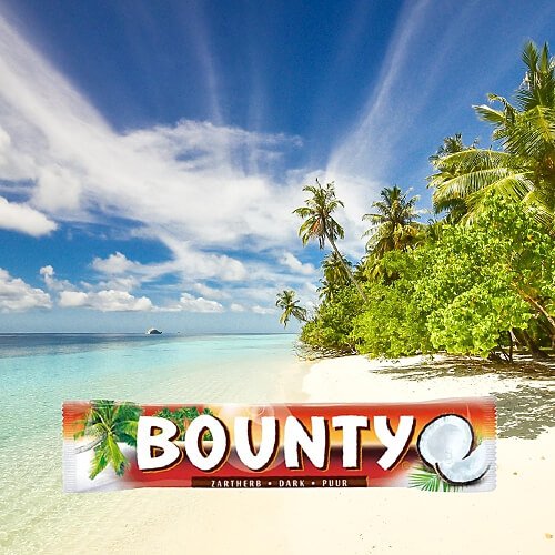 Bounty dark chocolate bar with red wrapper against a tropical beach backdrop