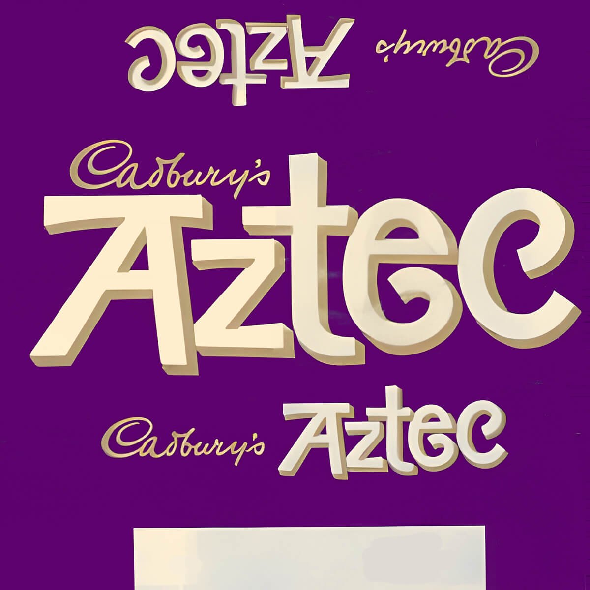 Cadbury's Aztec chocolate bar wrapper from the 1970s. Purple with white and gold text logo.
