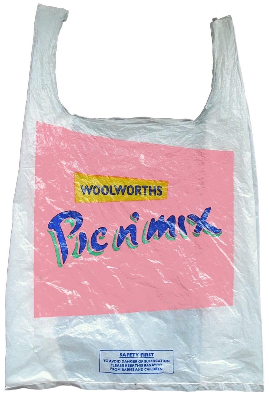 Woolworths Pic n' Mix bag from the 1980s. White with pink square graphic and blue and green text.