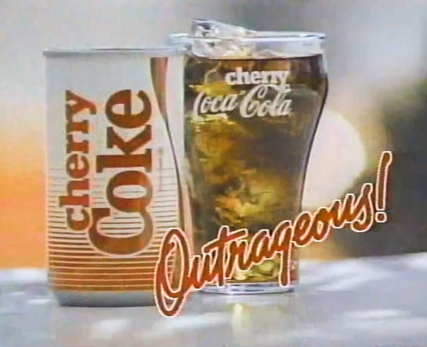Cherry Coke advert from 1985. Glass of cola with striped red and white can