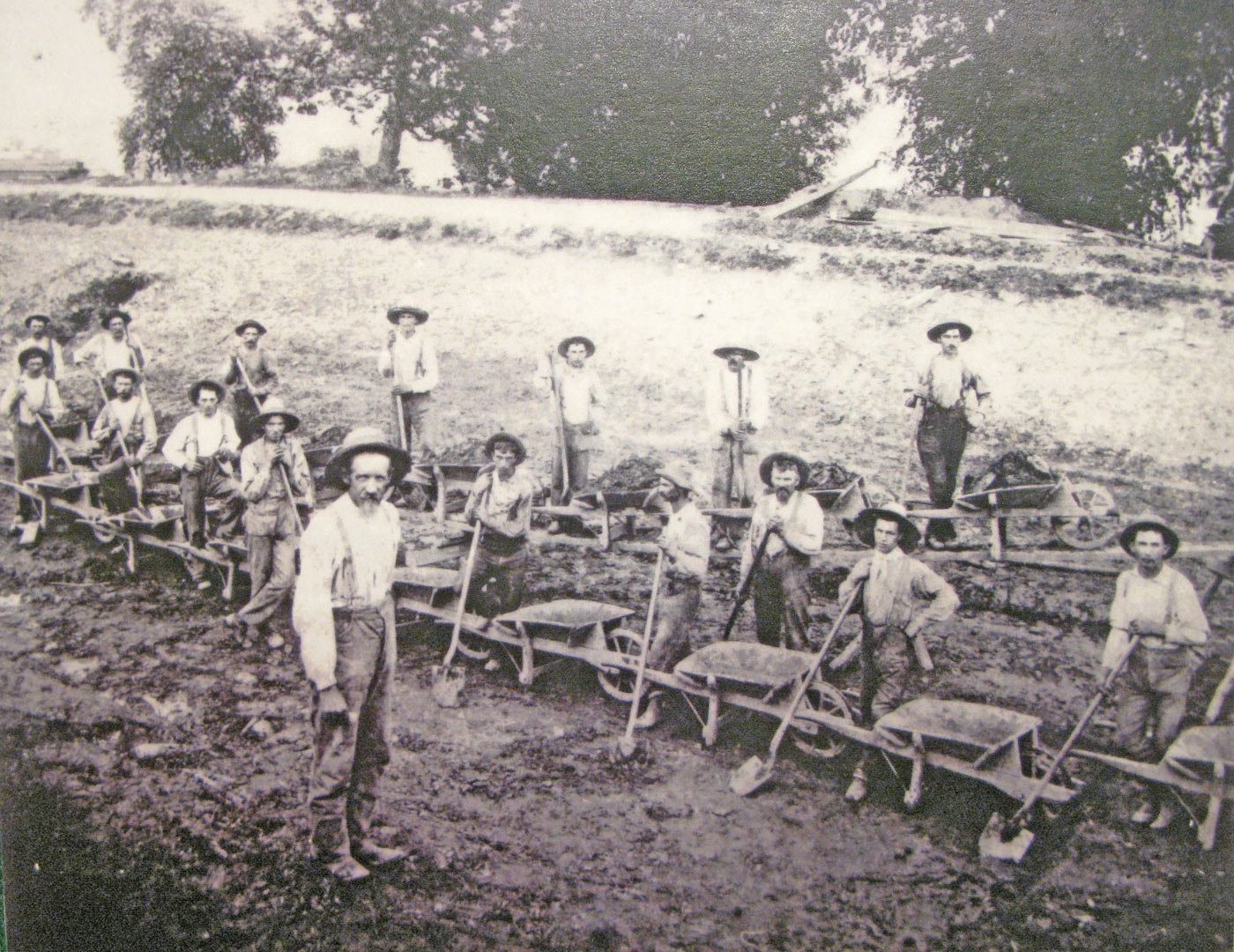 Irish immigrants built the Canal in Indiana using shovels, picks, wheelbarrows, and horse-drawn slip-scoops. By 1837, 1,000 laborers worked on the state's canal system. Accidents, fever, cholera, fights, and snakebites took a heavy toll on the workforce. The toll in lives from building the Canal was contested by some canal historians.