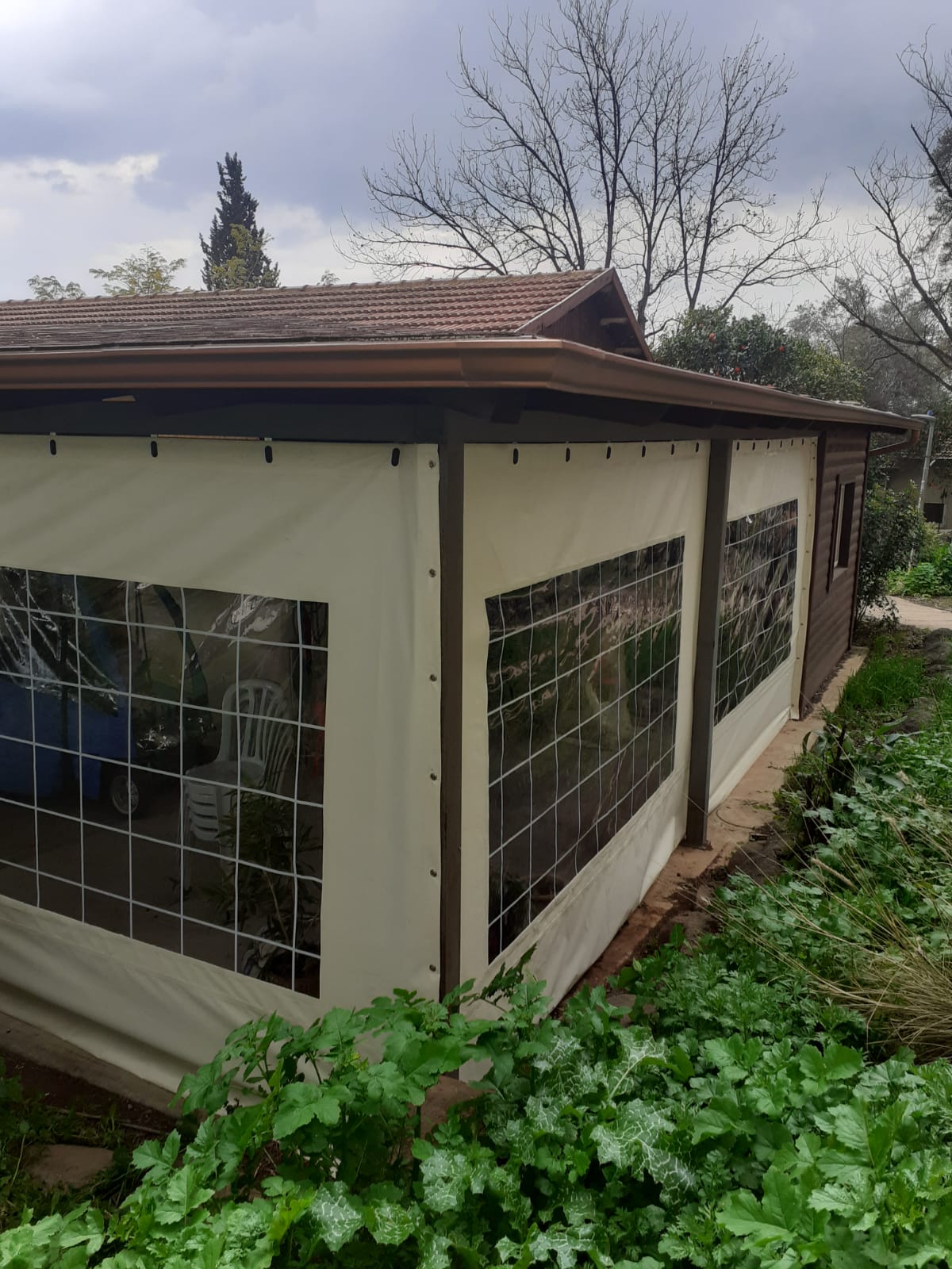 Tarpaulin costume made with transparent fabric